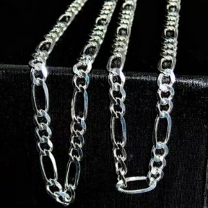 Par de cadenas de plata y oro blanco